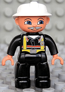 Duplo Figure Lego Ville, Male Fireman, Black Legs, Nougat Hands, White Helmet, Light Gray Moustache