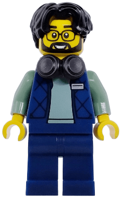 Art Factory Photographer - Male, Dark Blue Bodywarmer Over Sand Green Sweater, Dark Blue Legs, Black Hair Parted on Right, Headphones Around Neck