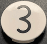 Tile, Round 2 x 2 with Bottom Stud Holder with Black Kissy Mouth / Number 3 Pattern