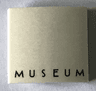 Slope, Curved 2 x 2 x 2/3 with 'MUSEUM' Pattern