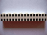 Brick 1 x 8 with Ferry Squares Black 32 in 2 Lines Pattern
