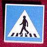 Road Sign 2 x 2 Square with Clip with Black Crosswalk and Pedestrian Silhouette in Triangle on Blue Background Pattern