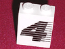 Panel 1 x 2 x 2 - Solid Studs with Black Number 4 and Lines Pattern