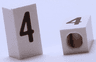 Tile, Modified 1 x 2 x 5/6 Stud Hole in End with Black Number 4 Pattern