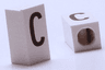 Tile, Modified 1 x 2 x 5/6 Stud Hole in End with Black Capital Letter C Pattern