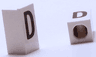 Tile, Modified 1 x 2 x 5/6 Stud Hole in End with Black Capital Letter D Pattern