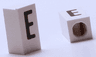 Tile, Modified 1 x 2 x 5/6 Stud Hole in End with Black Capital Letter E Pattern