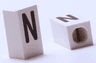 Tile, Modified 1 x 2 x 5/6 Stud Hole in End with Black Capital Letter N Pattern