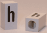 Tile, Modified 1 x 2 x 5/6 Stud Hole in End with Black Lowercase Letter h Pattern