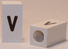 Tile, Modified 1 x 2 x 5/6 Stud Hole in End with Black Lowercase Letter v Pattern