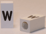 Tile, Modified 1 x 2 x 5/6 Stud Hole in End with Black Lowercase Letter w Pattern