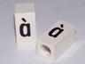 Tile, Modified 1 x 2 x 5/6 Stud Hole in End with Black Lowercase Letter a with Grave (à) Pattern