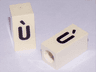 Tile, Modified 1 x 2 x 5/6 Stud Hole in End with Black Lowercase Letter u with Grave (ù) Pattern
