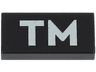 Tile 1 x 2 with Light Bluish Gray 'TM' Pattern