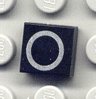 Tile 1 x 1 with Silver Capital Letter O Pattern