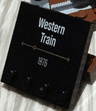Tile, Modified 4 x 4 with Studs on Edge with 'Western Train 1976' Pattern