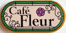 Tile, Round 2 x 4 Oval with Black 'Café Fleur' (Cafe), Filigree and Dark Pink Flower on Light Nougat Background with Bright Green Border Pattern