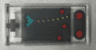 Tile 1 x 2 with Handheld Video Game with Directional Pad, Red Buttons, and Spaceship on Black Screen Pattern