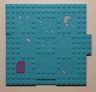 Brick, Modified 16 x 16 x 2/3 with 1 x 4 Indentations and 1 x 4 Plate with Paw Prints, Snow Patches and Magenta Throw Rug Pattern