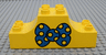 Duplo, Brick 2 x 6 x 2 Arch Inverted Double with Blue Bow Tie with Polka Dots Pattern