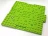 Brick, Modified 16 x 16 x 2/3 with 1 x 4 Indentations and 1 x 4 Plate with Grass and Rocks Pattern