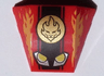 Wedge 4 x 3 Triple Curved No Studs with Yellow and Silver Headlights, Gold Ninjago Fire Power Emblem and Flames Pattern
