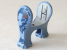 Dinosaur Legs Short with Light Gray Middle Section with Dark Blue, Dark Gray, and Red Pattern