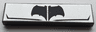 Tile 1 x 4 with Black Bat Symbol and Angled Lines on Silver Background Pattern (BrickHeadz Tactical Batman Chest)